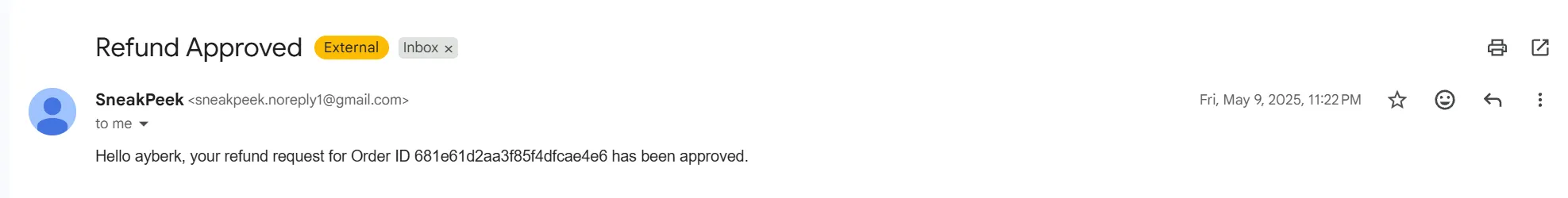 A Refund Approved email referencing a specific order ID